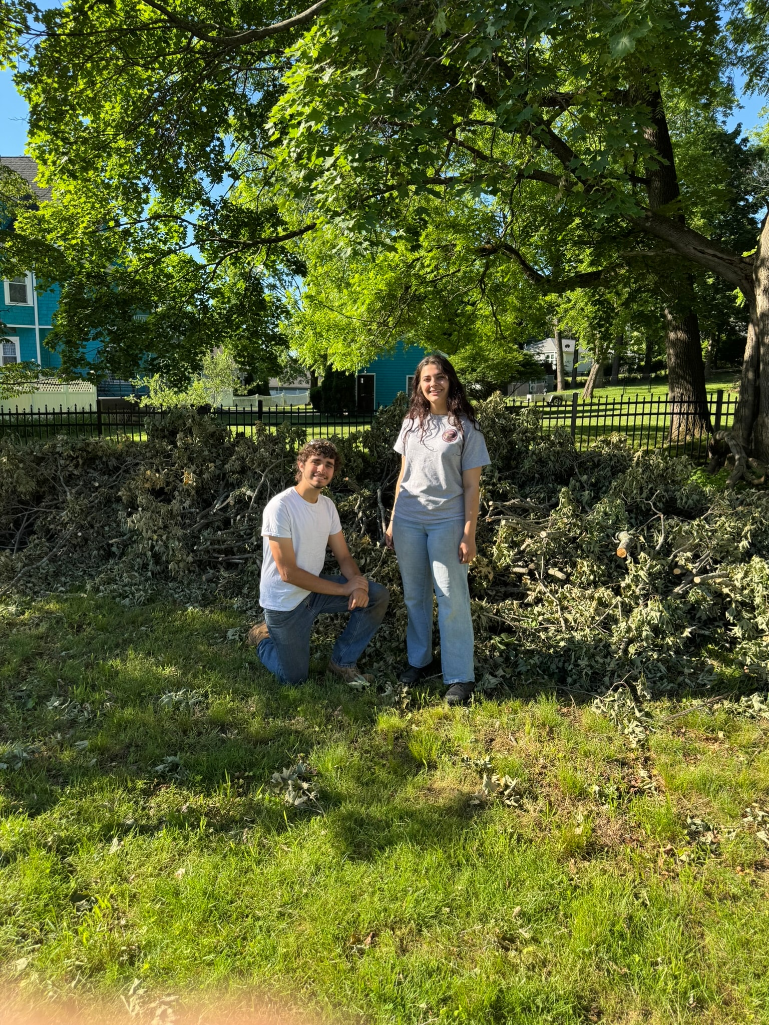 Autumn Landscaping crew after tree removal